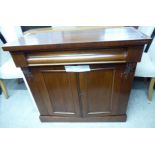 A late Victorian mahogany chiffonier with a frieze drawer, over a pair of panelled doors,