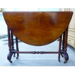 A late Victorian walnut Sutherland table,