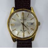 A Technos Skylight gold plated cased wristwatch, the automatic movement with sweeping seconds,