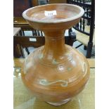 A Chinese 'antique' pottery vase of bulbous form with a narrow, waisted neck,