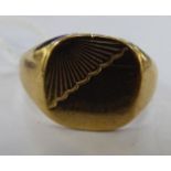 A 9ct gold signet ring 11
