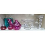 Decorative glassware: to include a pair of crystal knopped candlesticks 10''h;