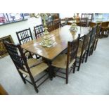 A modern oak refectory style dining table with a freeform top,