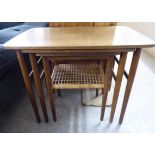 A nesting set of three 1970s teak framed occasional tables,