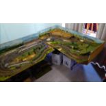 A 00 gauge model railway layout, comprising track and terrain approx.