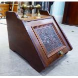 A late Victorian walnut coal purdonium with a carved,