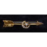 A Victorian 9ct gold and seed pearl set arrow brooch,