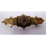 A late Victorian engraved bi-coloured 9ct gold bar brooch,