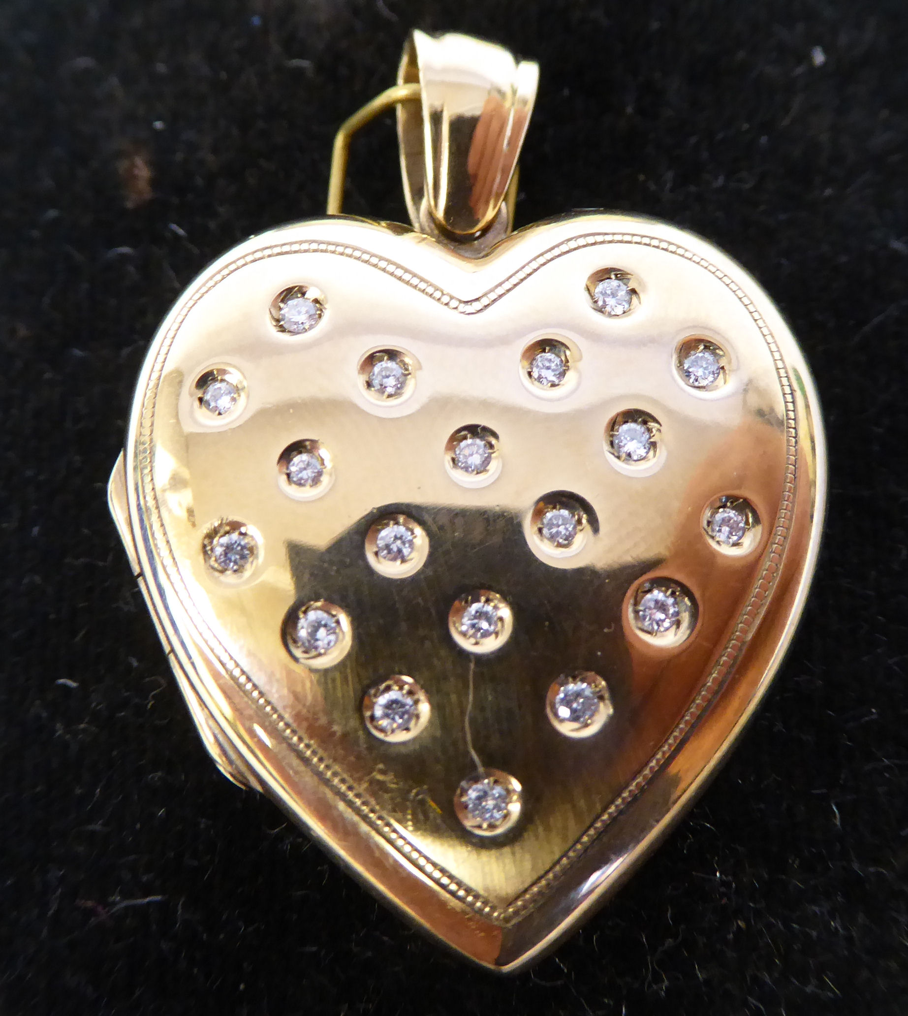 A 9ct gold heart shaped,