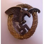 A German Luftwaffe Observer's badge with a burnished silver finished spreadeagle and swastika