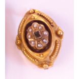 An early Victorian 15ct gold oval brooch,