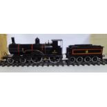 A 2.5'' gauge (approx) 4-4-0 electric model locomotive and tender, no.