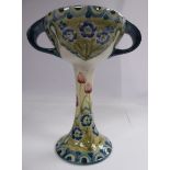 A Moorcroft Macintyre Florian ware pottery cup/vase, the wide, shallow,