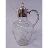 A late Victorian clear glass claret jug of square outlined,