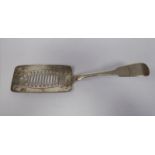 A George III Irish silver fiddle pattern fish slice,