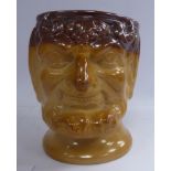 A late 19thC two-tone brown glazed stoneware Bacchus mask mug with a loop handle 5.