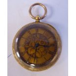 An Edwardian 18ct gold cased fob watch with engraved ornament,