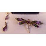 A gold, emerald green enamel, amethyst and diamond set dragonfly brooch with folding pendant rings,