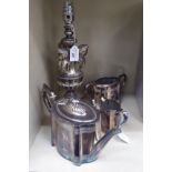 A three piece silver plated Victorian style tea set;