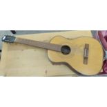 A six string accoustic guitar,