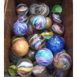 A collection of Victorian/early 20thC clear and coloured marbles OS3