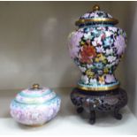 A cloisonne vase of waisted baluster form with a domed cover and finial 8.