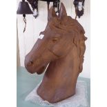 A rust coloured cast iron horses' head garden ornament 16''h BSR
