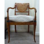 A modern Flemish inspired stained beech framed elbow chair,