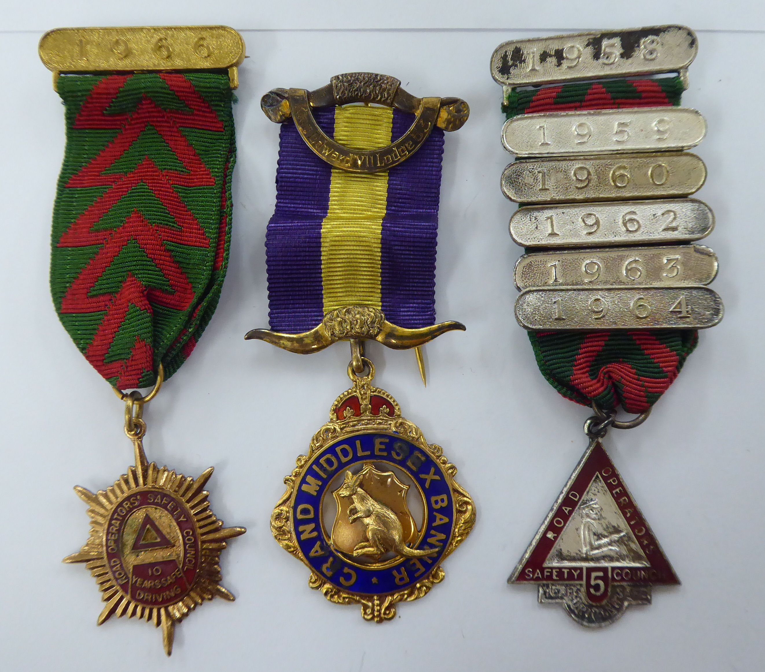 Three medals on ribbons, viz.