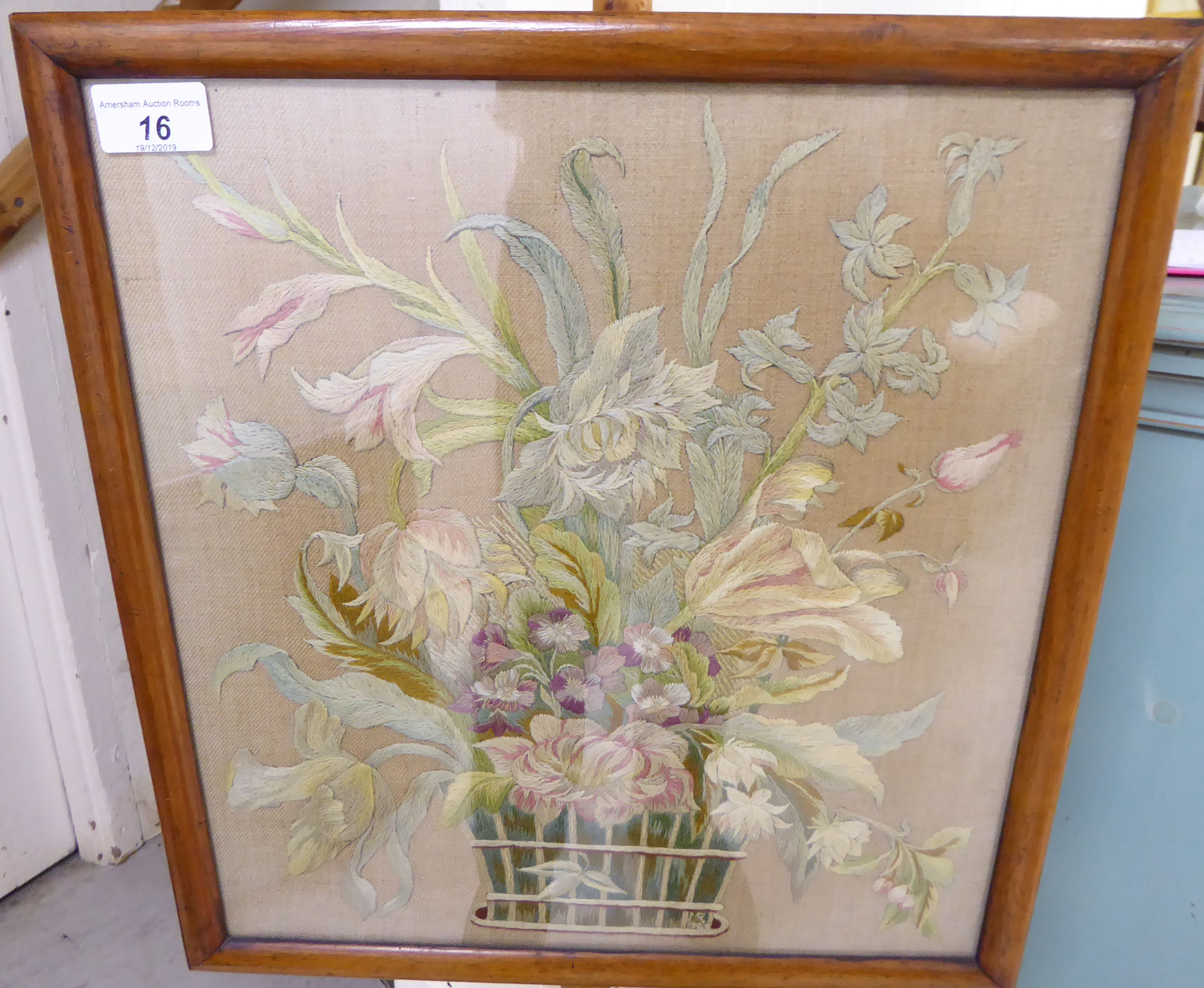 A 20thC reproduction of a Victorian walnut polescreen with a floral tapestry panel, - Image 2 of 2