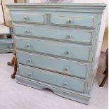 A modern washed green painted pine dressing chest with two short/four long drawers,