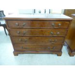 A modern crossbanded and burr walnut finished four drawer dressing chest,
