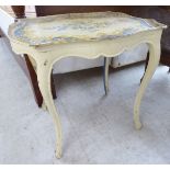A 20thC French inspired, 'shabby chic' painted occasional table,