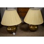 Pair of brass lamps