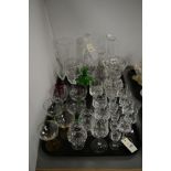 Glassware to include cut glass decanters, jug, vase and glasses of various sizes