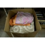 Box of linen to include table cloths and duvet covers