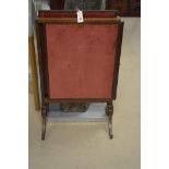 A 19th century mahogany framed fire screen