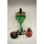Green glass table lamp; oil lamp and dish