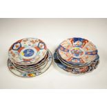 Japanese Imari plates and two others