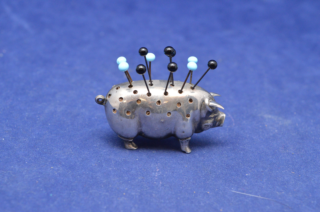 Silver pin cushion