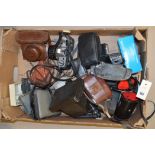 Box of vintage cameras