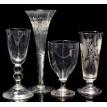 An ale glass; and three goblets.