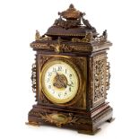 Marti: an ornate late 19th Century mahogany and gilt bronze bracket clock.