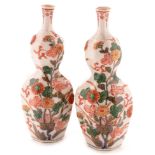 A pair of 18th Century Arita porcelain vases