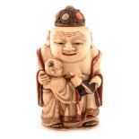 Chinese carved, painted and stained ivory figural snuff bottle