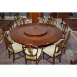 Chapmans 'Siesta' dining table., cabinet and twelve matching chairs