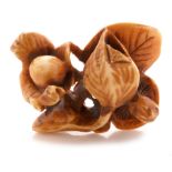 Japanese carved and stained ivory netsuke