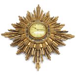 Japy Freres: a French gold painted sunburst pattern wall timepiece.