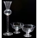 A pair of fruit bowls; and a goblet.