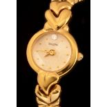 Bulova : A lady's gold tone and steel quartz wristwatch